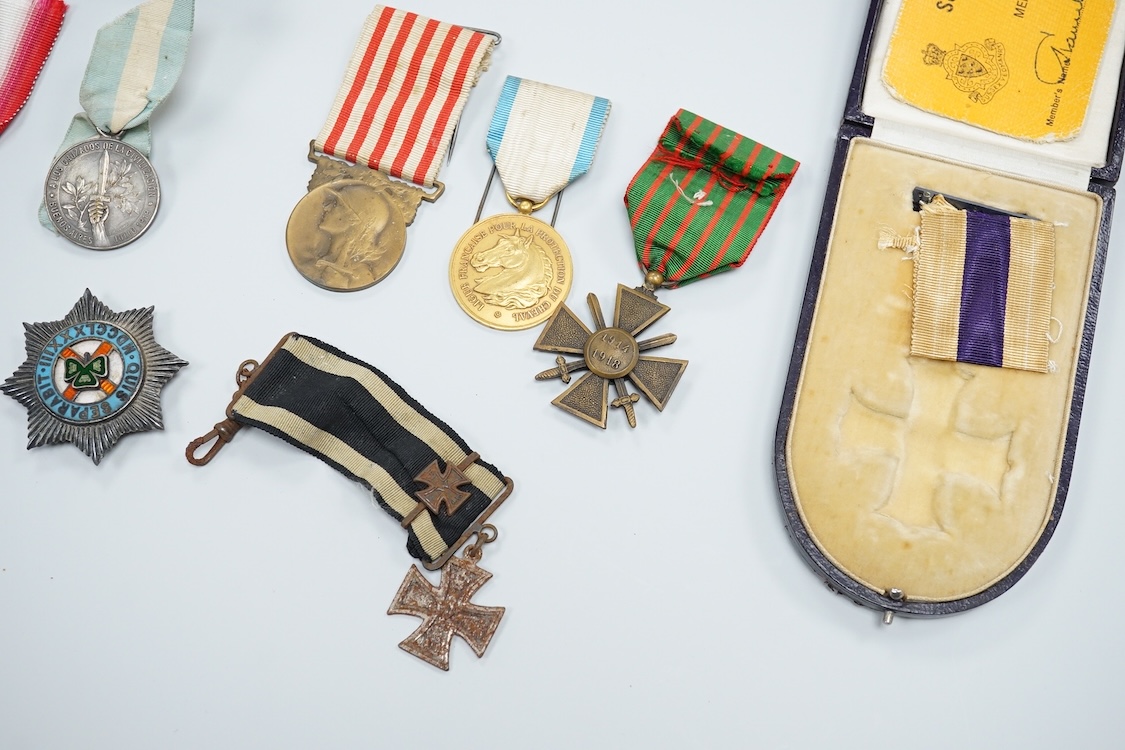 A quantity of assorted medals, an Essex crystal button, badges and ephemera